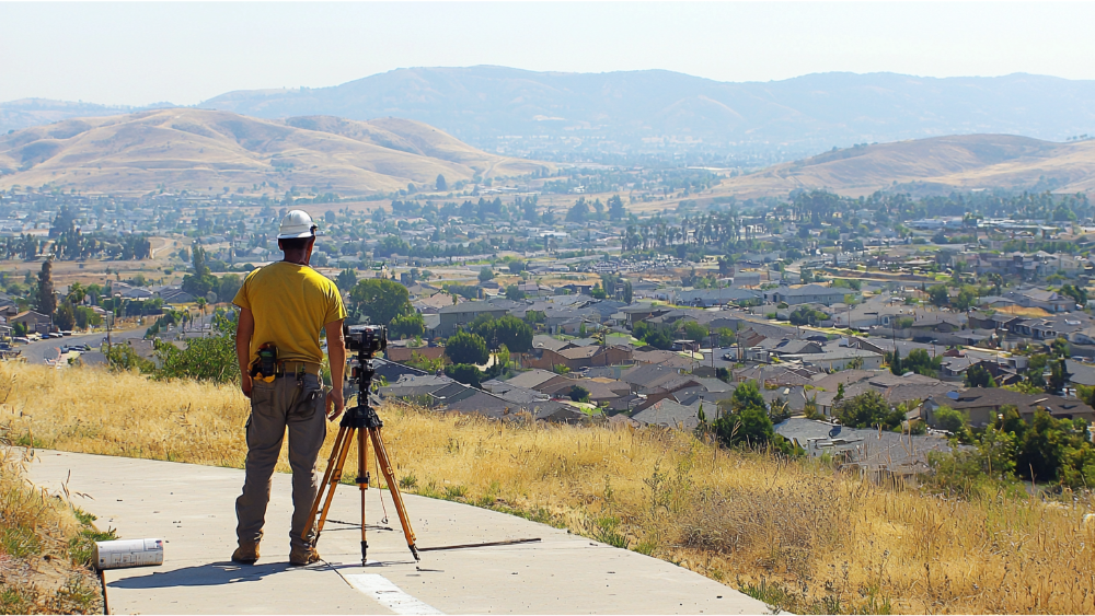 a man surveying land